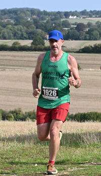 This photo is of Simon Large. It was taken by Racing Line Running